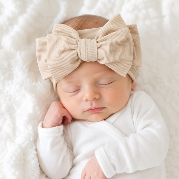 Beige geribbelde baby newborn haarband met grote strik