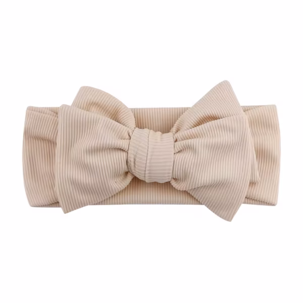 Beige geribbelde baby newborn haarband met grote strik