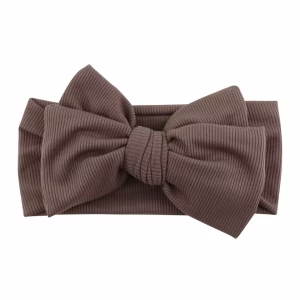 Bruin geribbelde baby newborn haarband met grote strik