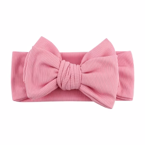 Roze geribbelde baby newborn haarband met grote strik