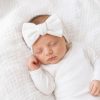 Wit geribbelde baby newborn haarband met grote strik